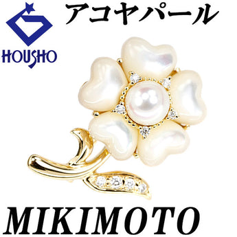 Mikimoto Akoya Pearl Brooch with Diamond and Shell in 18K Yellow Gold. This two-way pendant features a flower, plant, and botanical heart design. [Pre-owned] [Product Number: 901577]